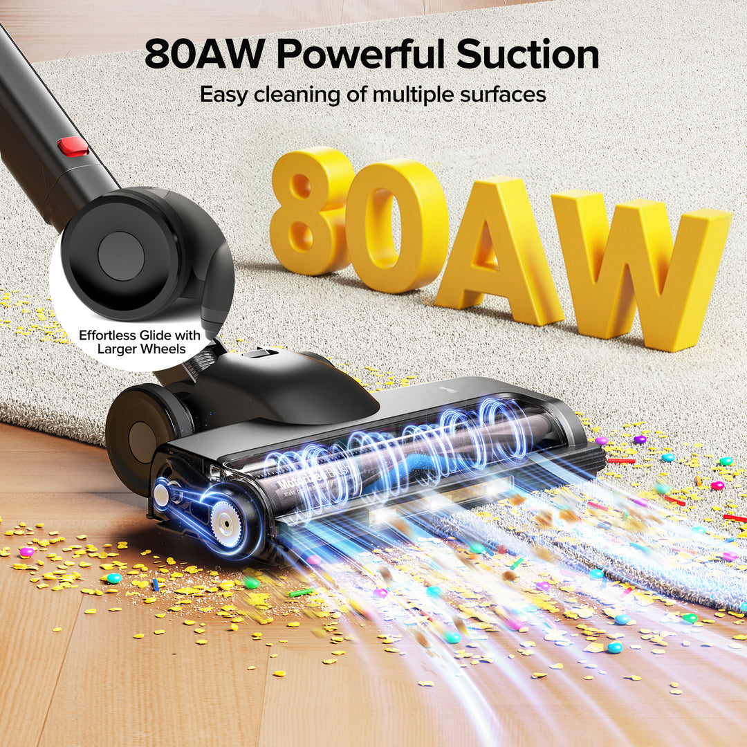 Vacuum cleaner with 80AW powerful suction on a surface with confetti, highlighting cleaning capabilities.
