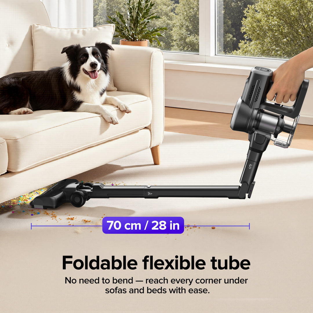 Foldable flexible tube of a vacuum cleaner with a dog on a couch in the background