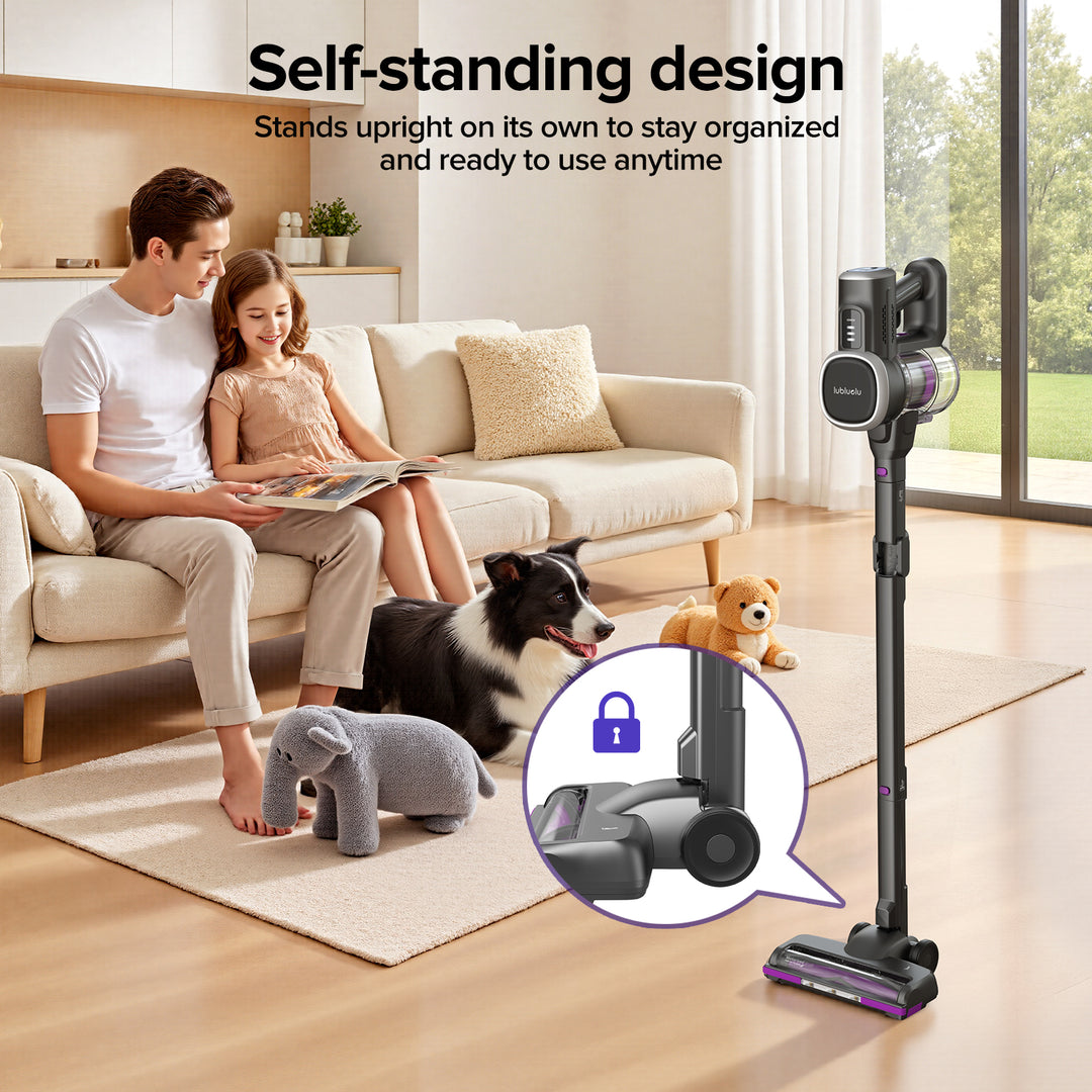 Couple with a dog and teddy bear in a living room with a self-standing vacuum cleaner.