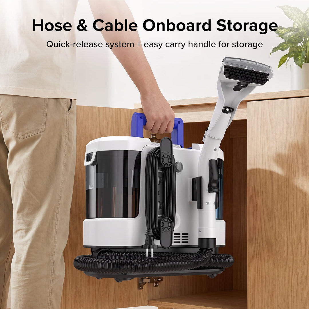 A cordless wet vacuum cleaner with a hose and handheld attachment, shown being stored inside a wooden cabinet by a person whose arm and legs are visible. The vacuum is primarily white and black with a blue handle grip.