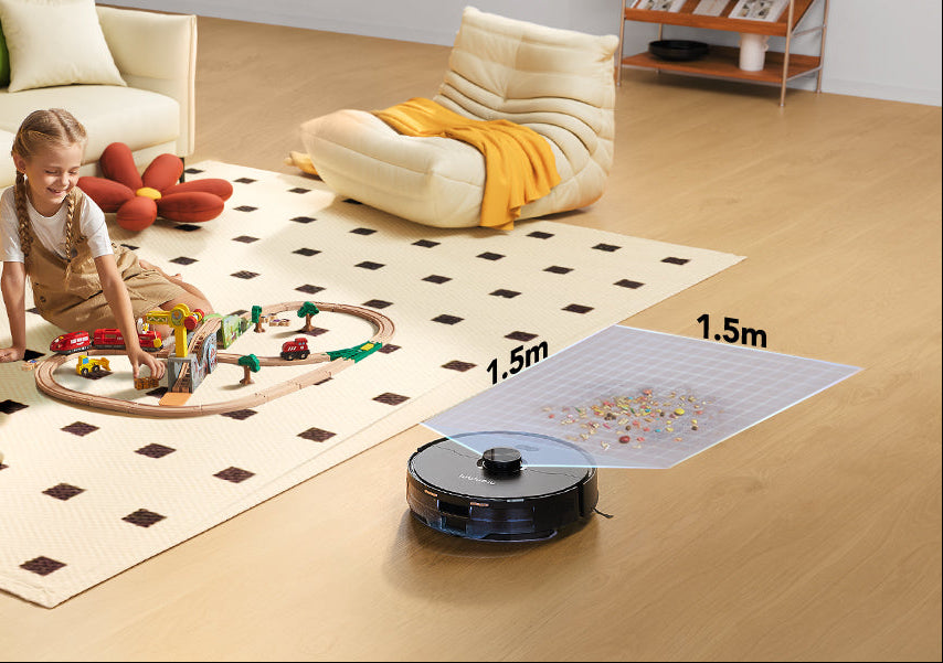 Robotic vacuum cleaner cleaning a living room with child playing on rug